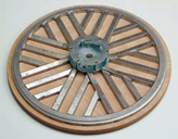 Wooden based grinding disc