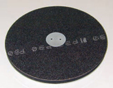 Grinding plate with flexible base